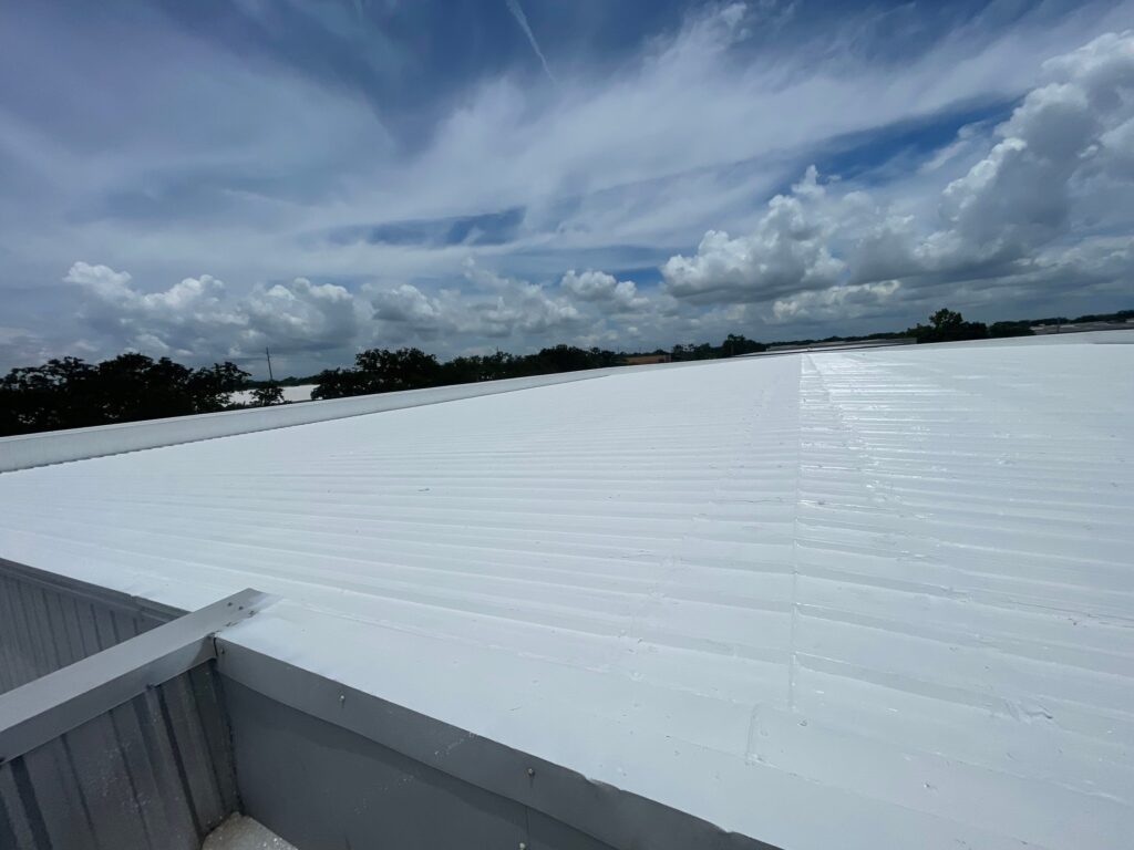 Commercial Metal Roof Coatings Florida: How Coastal Salt Air Destroys Metal Roofs (And How Protective Coatings Stop It), Port St Lucie metal roof coating services, Tampa silicone roof coating installation